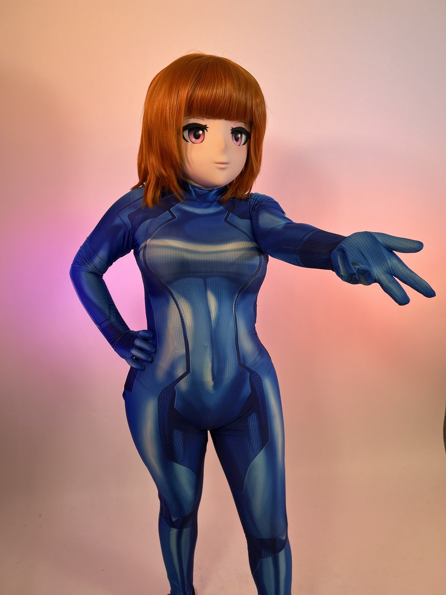 girlysenator's tweet photo. 📸 Take my hand and I shall show you wonders...  Decided to bring a Samus Zero Suit to the UK Xmas Kigu Meet 2025, to try a little bit of cosplay in #kigurumi!  

Mask generously borrowed from @ElizzieHimeKig 

Photos taken on my phone, can not remember who took them :(. https://t.co/n9rUGAEOtL