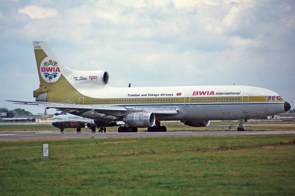 n194at's tweet photo. BWIA West Indies Airways 
Lockheed L-1011-500 9Y-THA Line #222
LHR/EGLL London Heathrow Airport
August 1987
Photo credit Brian T. Richards
#AvGeek #Airline #Aviation #AvGeeks #Lockheed #L1011 #TriStar #LHR #Heathrow #London @HeathrowAirport #BWIA https://t.co/lnZh135F0J
