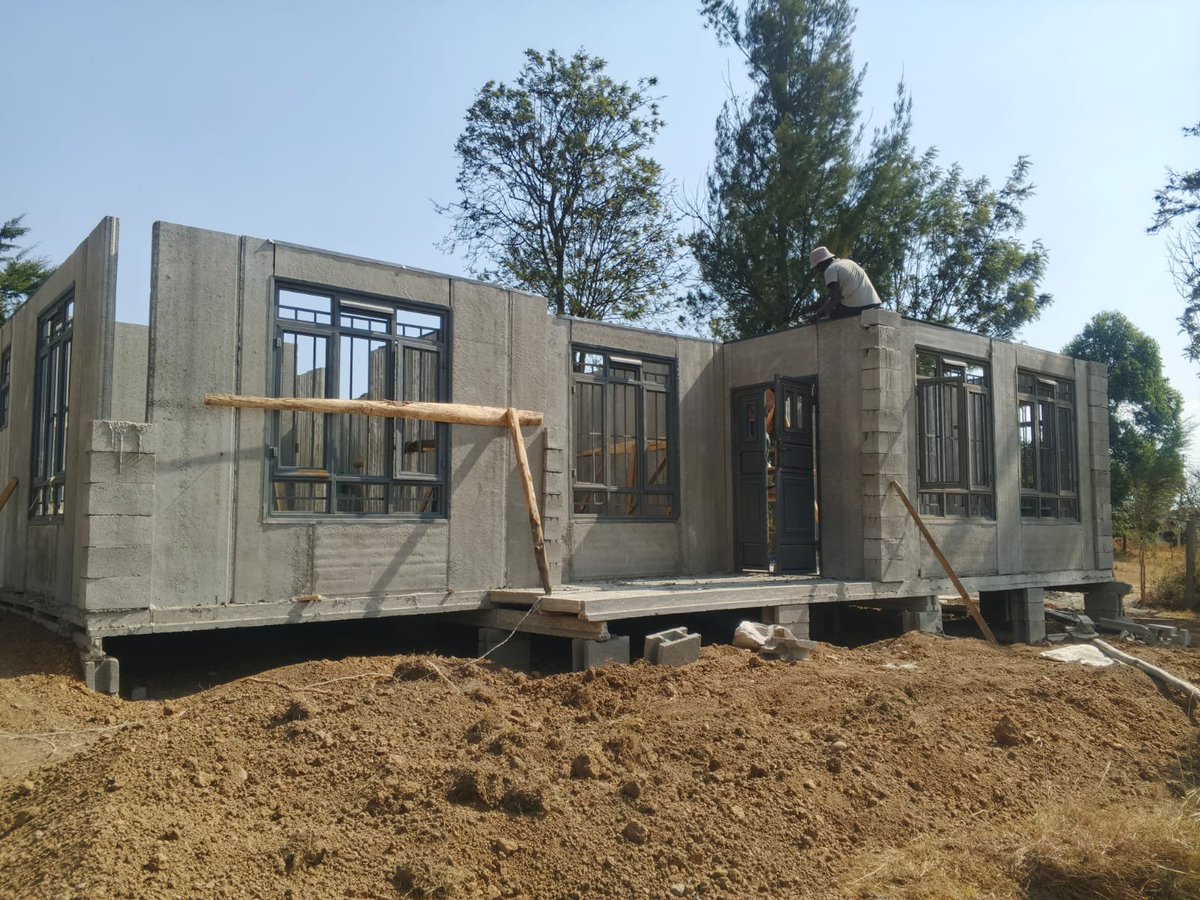 akibaru's tweet photo. Nanyuki: 

Have you ever heard the locals in Nanyuki shout:

“Njoroge! Toka uone ka kanyumba ka mera!” 😁( is this housing growing like a plant 🪴) 

That’s what they now call our precast homes because they seem to grow overnight.

This 122 sqm, 3-bedroom, 2-bathroom home reached this stage in just 7 days.

All that’s remaining is the roof covering. Once that’s done, the house becomes weatherproof and burglar-proof, ready for interior finishes.

✅ No plastering.
✅ Factory-smooth wall panels.
✅ Just skim, paint, tile, install cabinets, and move in.

This is the power of factory-manufactured housing—faster construction, predictable costs, better quality control, and less dependence on lengthy on-site masonry work.

For many Kenyans in the diaspora, it’s also peace of mind. Your home is manufactured in a controlled factory environment and assembled on-site in days, making it easier to monitor progress and reducing the risks that often come with long construction projects.

Ka Kanyumba Ka Mera isn’t just a nickname anymore—it’s proof that the future of building has arrived.

Price remains Sh 15,000/- per sqm for a precast shell . 

📞 Engage Floor Decor Kenya
☎️ 0722 679 830