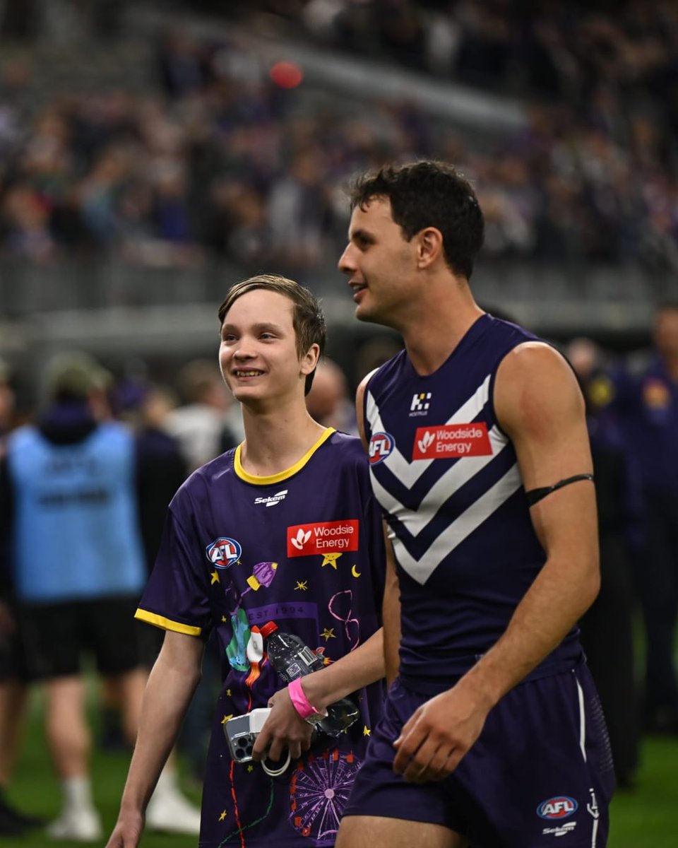Starlight_star's tweet photo. For 24 years, Purple Haze has created unforgettable moments for sick kids. This year, the Fremantle Dockers celebrated a win on the field as well as a milestone of 102,564 children supported. Thank you, @freodockers and South32, for creating moments that matter. 💜 https://t.co/0XsFNLiIeo