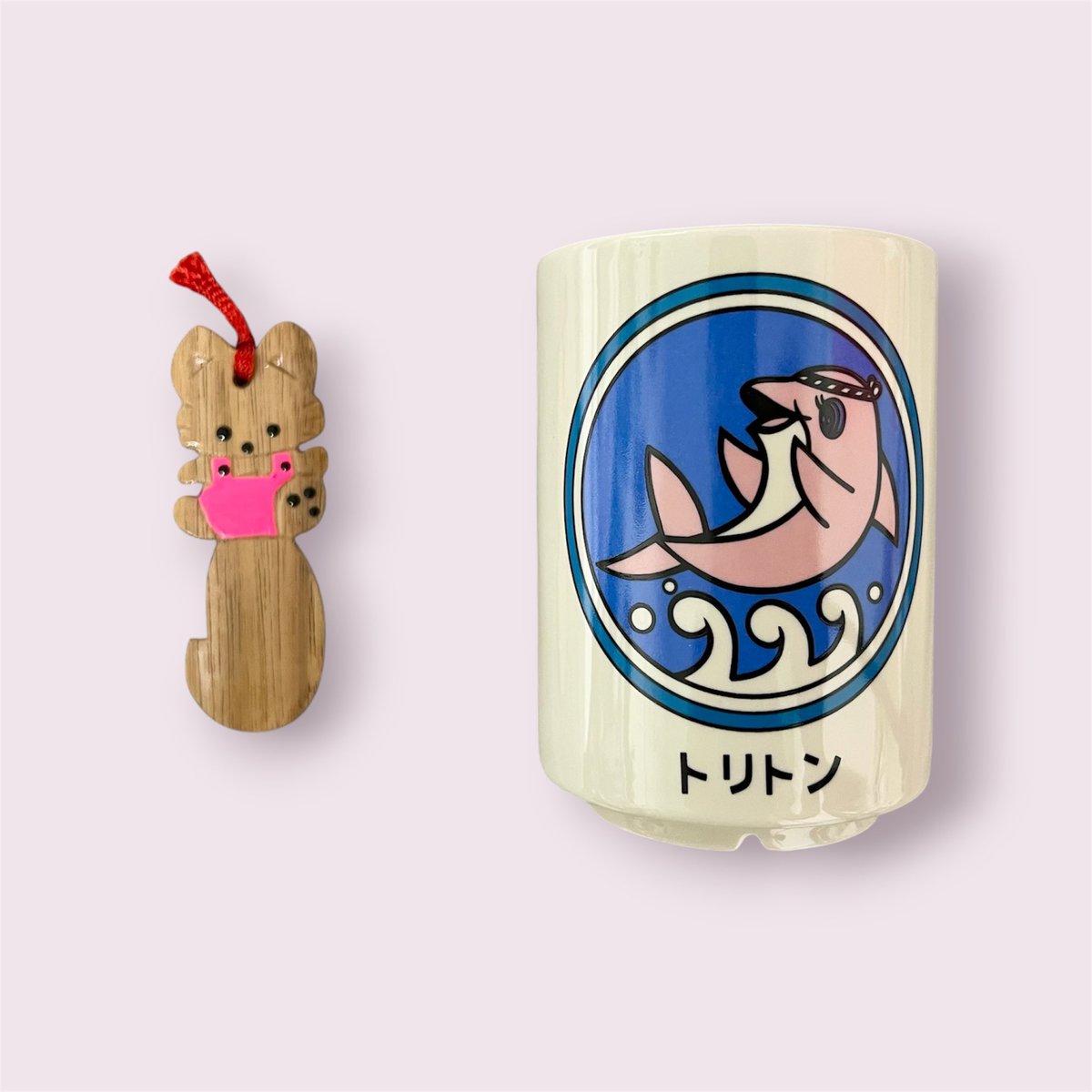 muzzlin's tweet photo. 北海道のおみやげ
キタキツネの木製しおりと、トリトンの湯のみ https://t.co/EHJHNanZL3