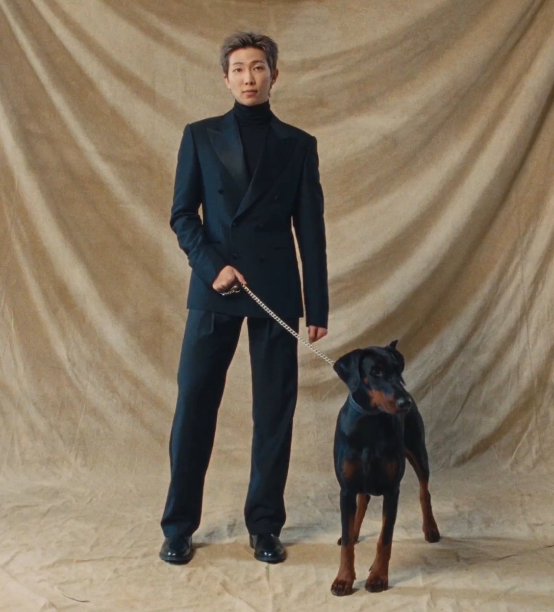 molemates's tweet photo. namjoon being paired up with doberman bc he’s bam’s other dad https://t.co/IlKuEZQ6o2
