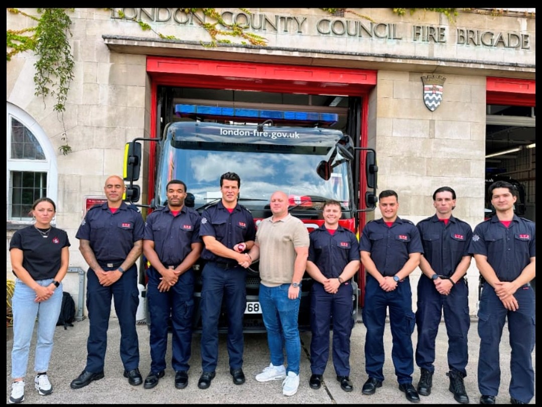 LondonFBU's tweet photo. Tooting's Branch Secretary Lee Phillips receives his 25 year pin from London Regional Secretary Jon Lambe alongside members of Tooting Blue Watch &amp; Regional Organiser Vicky Shaw. https://t.co/ZmVhQM8YAa