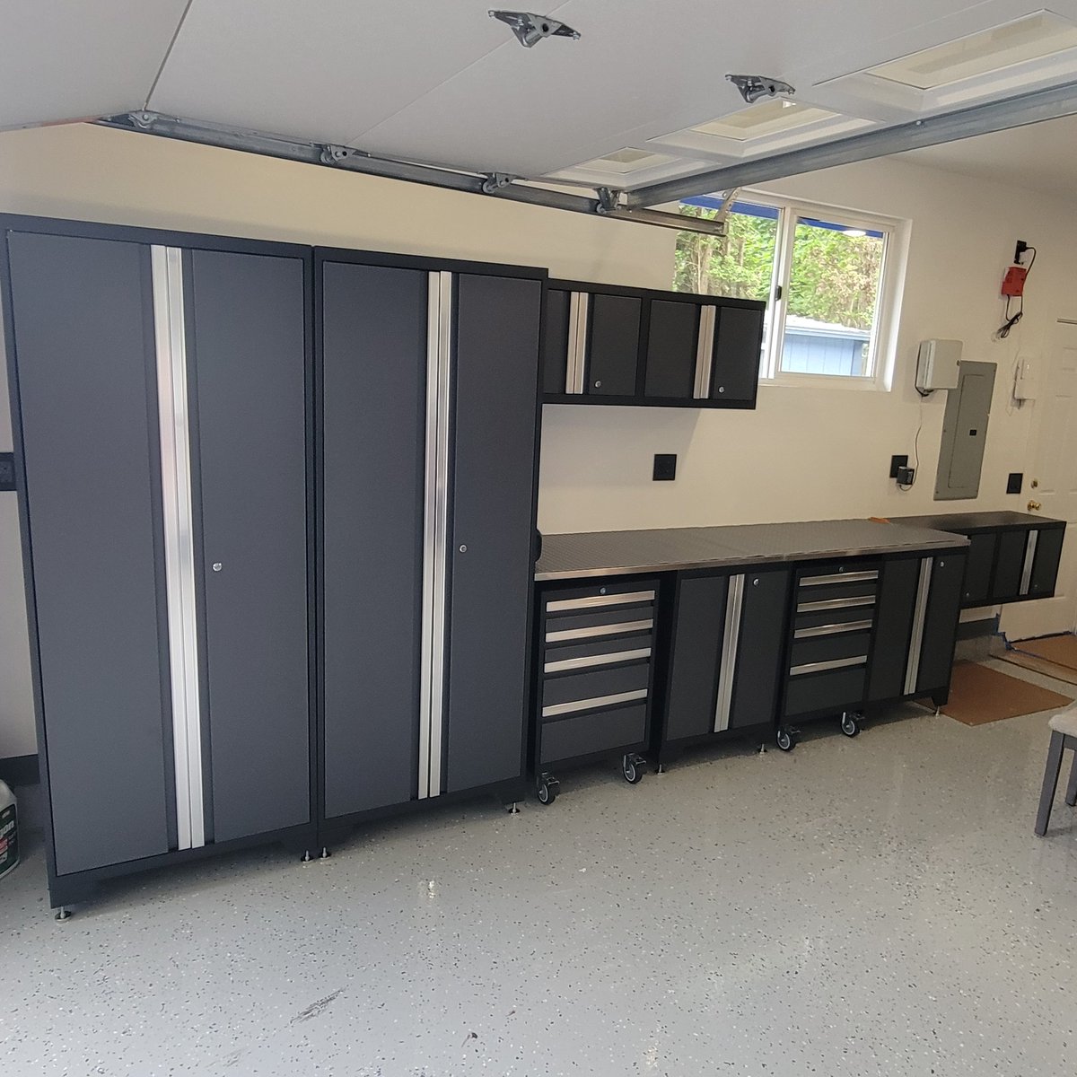 Sprycatz's tweet photo. @NewAgeProducts I purchased a set and reconfigured it to meet my needs. Im a disabled vet, so it took me a few days to set this up. I love it. Everything is mounted to studs and the other cabinets. I recommend checking them out if you need garage and tool storage. https://t.co/Ce0eAunl5f
