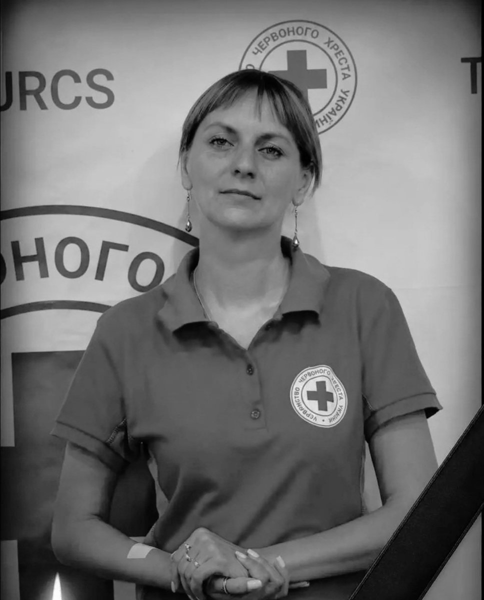 NAFOvoyager's tweet photo. Last night, russia killed Olena Arkhipova in Odesa.

She was a mother of three, a volunteer, and a first aid instructor with the Ukrainian Red Cross.

She was running with her children to a shelter when a russian missile struck.

Her children survived.

Olena did not.

She taught first aid to emergency responders, police officers, adults, and children. She was supposed to begin a new course for people with disabilities today.

Rest in peace, Olena.

russia killed her.