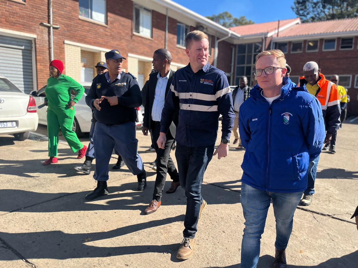 DeanMacpherson's tweet photo. This morning, alongside @UmngeniLocal @MayorPappas, I visited Howick Police Station to see the improvements completed by the Department of Public Works & Infrastructure.

The holding cells have been restored back to operational use after being closed since 2019. 

The work included cleaning and repainted, while damaged roofs, lights, water pipes and flush systems have been repaired.

This means the police can focus on fighting crime instead of driving detainees to Pietermaritzburg which is an hour away. 

This is a clear example of what can be done by the Department and what can be achieved when we deliver quality work that helps client departments better serve communities like uMngeni. #LetsBuildSA 💙🇿🇦