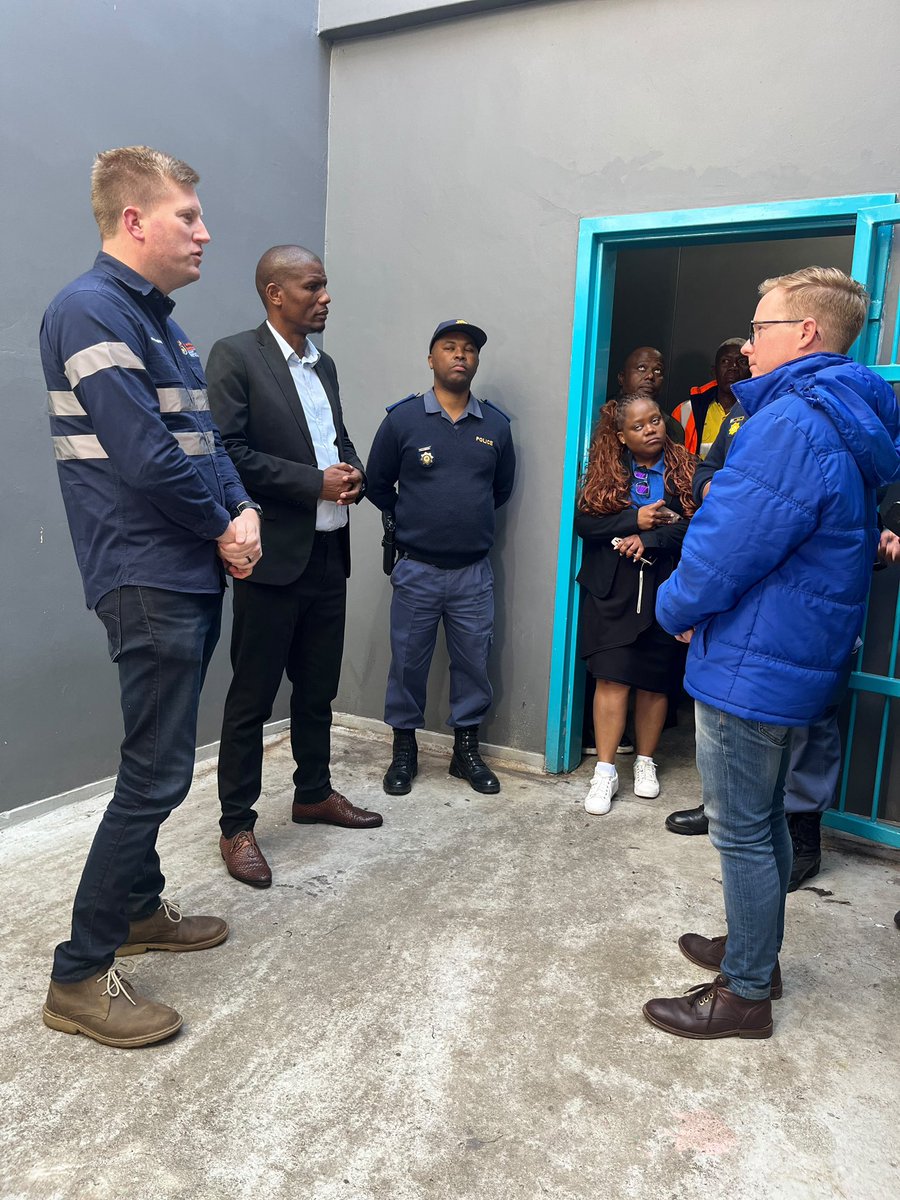 DeanMacpherson's tweet photo. This morning, alongside @UmngeniLocal @MayorPappas, I visited Howick Police Station to see the improvements completed by the Department of Public Works & Infrastructure.

The holding cells have been restored back to operational use after being closed since 2019. 

The work included cleaning and repainted, while damaged roofs, lights, water pipes and flush systems have been repaired.

This means the police can focus on fighting crime instead of driving detainees to Pietermaritzburg which is an hour away. 

This is a clear example of what can be done by the Department and what can be achieved when we deliver quality work that helps client departments better serve communities like uMngeni. #LetsBuildSA 💙🇿🇦