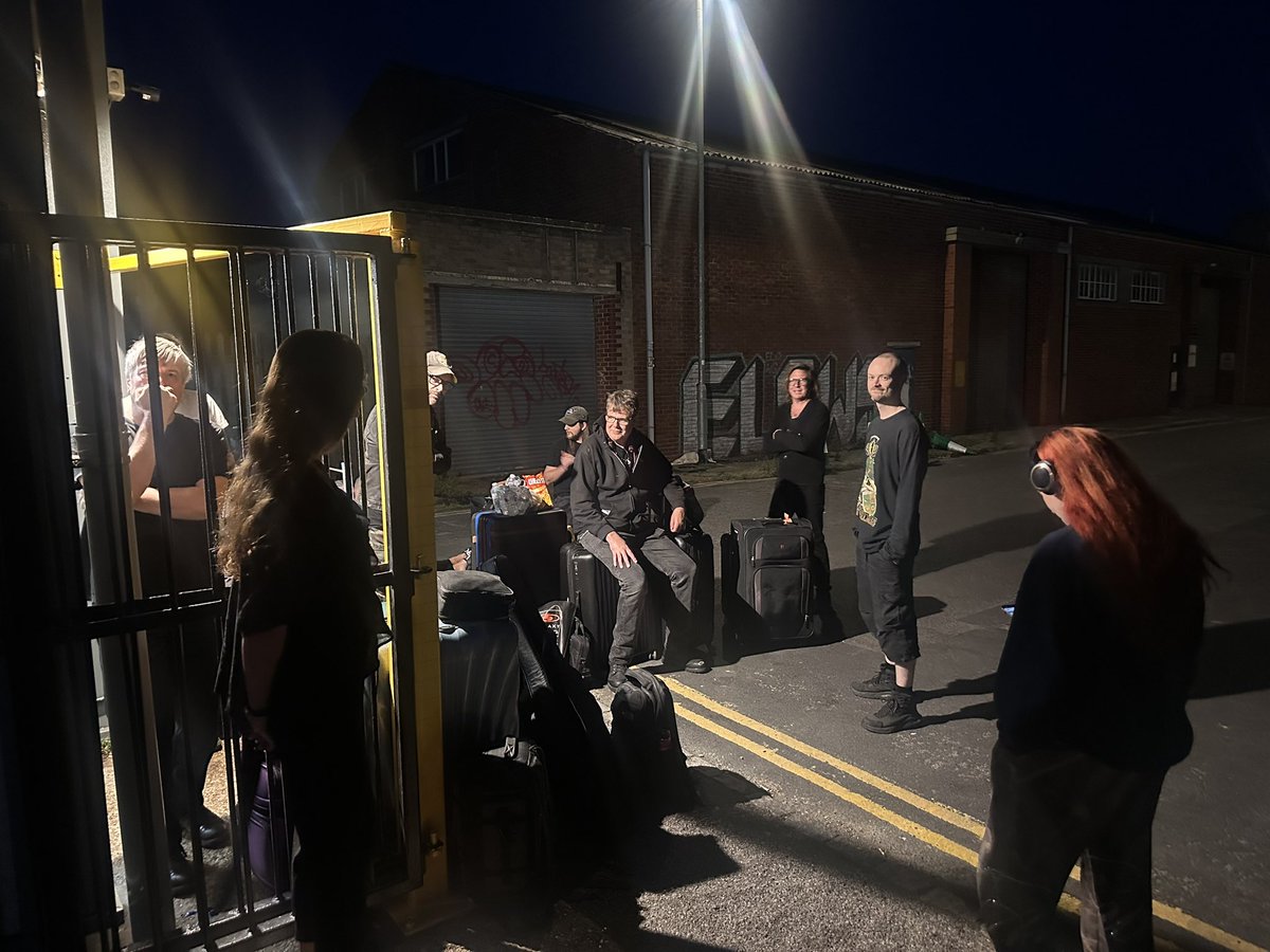 numanofficial's tweet photo. So, last night after rehearsals in Brighton our bus failed to arrive on time as it had an issue. We stood out in the street for a few hours trying to figure out an alternative way of getting to Glasgow in time. The bus eventually arrived at midnight but it was broken so we had to drive to Oxford and change to a different bus (around 2am) and then drive to Glasgow. Got here around 11am. A slightly shaky start to the tour. But, we are all here, the weather is good (which is a relief as it’s an open air show tonight) and the venue looks great. We have a significantly different collection of songs for this tour so I hope you like all the changes, plus a brand new light show of course. Looking forward to it. See you all soon. Tix: https://t.co/fhSqepNVNM