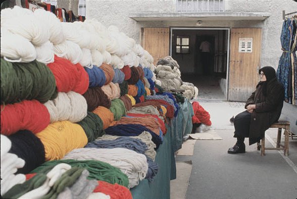 YugoslavVisuals's tweet photo. Yarn seller in Ljubljana, 1980. https://t.co/GRUkYoVd8B
