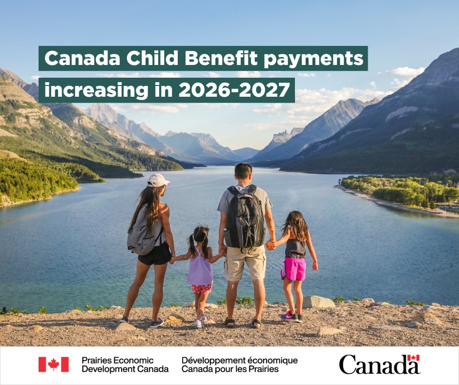 A scenic view of Upper Waterton Lake surrounded by mountains under a blue sky. In the foreground, four people stand on a lookout facing the lake and holding hands. Overlaid text reads, “Canada Child Benefit payments increasing in 2026-2027.”