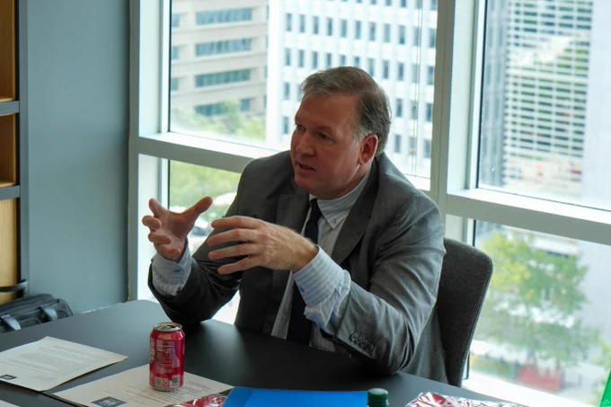 Close up photo of DAS O'Leary sitting and speaking.