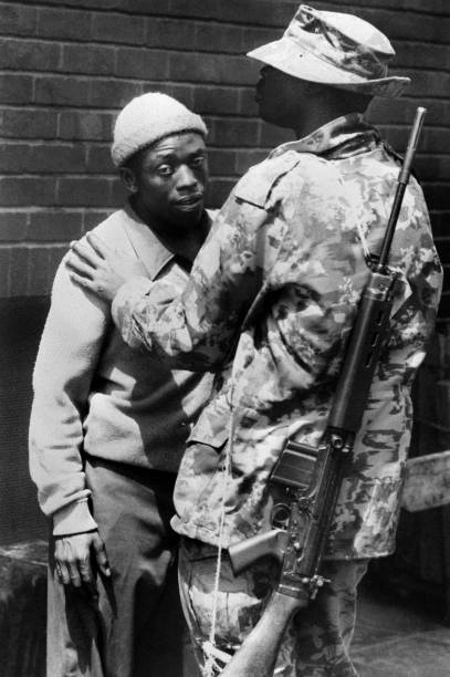 HistorySAZAR's tweet photo. A soldier arrests a demonstrator in Soweto, June 1976. Source: AFP https://t.co/elRVljAkuL