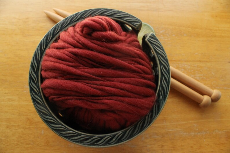 thefinelime's tweet photo. rich, rustic red, #merinowool, #handspun in a textured, thick and thin style. So soft and pretty! https://t.co/jYSZDlSoxP via @Etsy https://t.co/7ws5funNo3