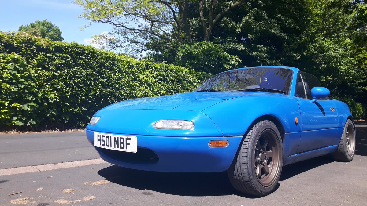 MarkStanton89's tweet photo. @itsmeshaunie I have a 1991 Mazda MX5 (Technically a Eunos Roadster, as its the JDM model and was imported to the UK in 1998. I also have a second, UK market one in blue https://t.co/JDM6gBR9O0