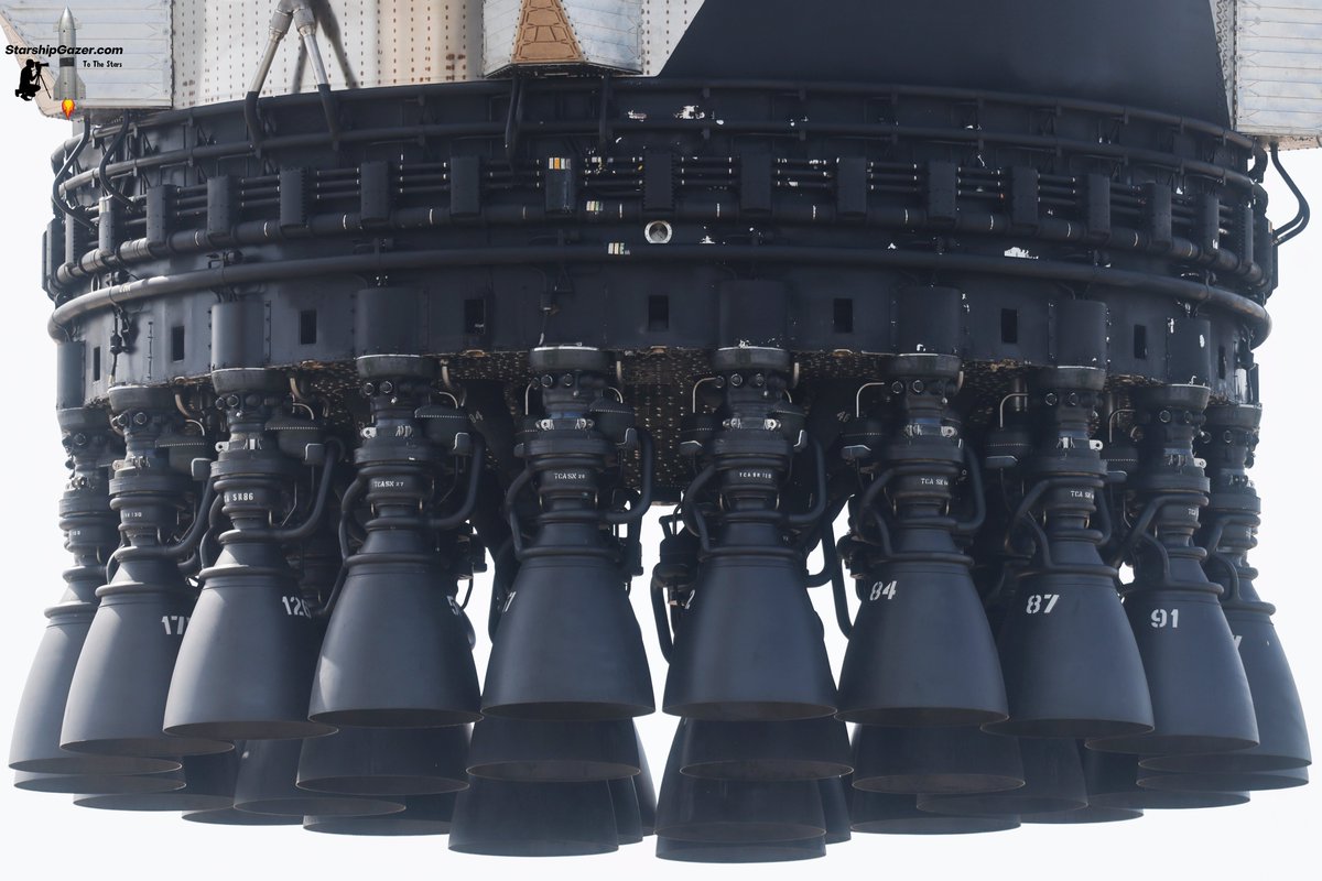 StarshipGazer's tweet photo. A look at Booster 20's Raptor 3 engines while being lifted off of pad 2 today after an aborted launch attempt yesterday. 

7/17/26 https://t.co/JyOb1v8I1M