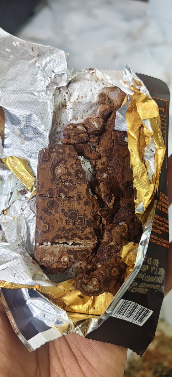 MdKaishaf's tweet photo. Hey @Amul_Coop what the hell is this I purchased your Amul Dark Chocolate today, and to my shock, after opening the pack I found what appear to be white egg-like formations/fungal or parasitic contamination inside the chocolate. 1/2 https://t.co/fkmulx1Hfh
