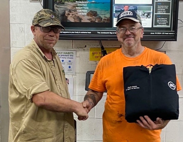 BCISolutionsInc's tweet photo. Clyde recently celebrated 5 years with BCI. To mark the occasion, his supervisor Tom presented him with a Carhartt jacket. Thank you, Clyde, for your hard work, dedication and the impact you make as part of Team BCI. #Manufacturing #machining #USAMade #StatusQuoSucks https://t.co/7EvX3drgts