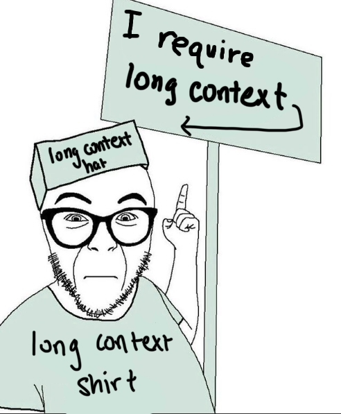 A hand-drawn cartoon in the "soyjak" meme style, colored in pale mint green. It shows a wide-eyed man with glasses, stubble, and an open-mouthed expression, holding up one index finger. He wears a paper hat labeled "long context hat" and a shirt labeled "long context shirt." He holds up a sign with an arrow pointing to it that reads "I require long context."