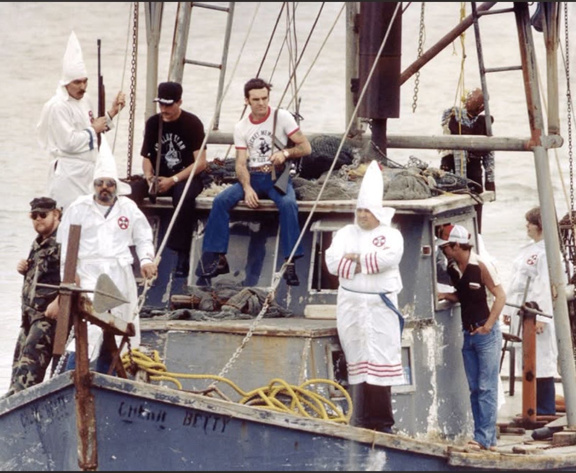 thoughtsfr4q's tweet photo. On the night of April 27, 1981, a ship carrying 10 white supremacists, three undercover agents, and a shocking arsenal of weapons was stopped as they departed New Orleans for the Dominican Republic - where they planned to overthrow the government and establish a white ethnostate.
Among other prominent names, the bizarre plot involved former KKK Grand Wizard David Duke and then-Representative Ron Paul. See how this nefarious plot failed spectacularly: https://t.co/cYl0T2nxF6