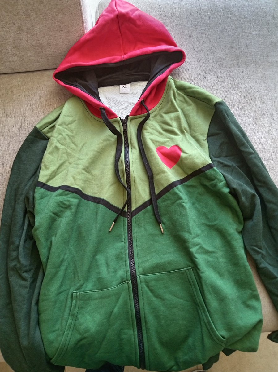 NickitsuKyoren's tweet photo. A month ago, I was browsing the Etsy online store looking for something interesting when I saw a sweatshirt with a Ralsei design, I decided to buy it since it was on sale, the package arrived today, and I’m excited to wear it every day when I go out for walks 💛🌸✨ https://t.co/NgqRxtIxRU