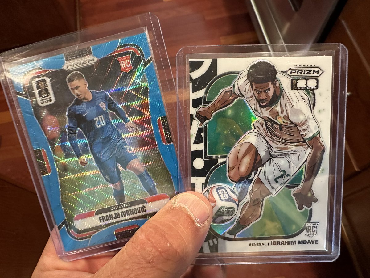 t_fay's tweet photo. @CardPurchaser Currently,  Prizm World Cup 2026. We just ripped the biggest card we've ever pulled. Mbaye RC Manga, from a Walmart blaster... https://t.co/WgnMfNFEgu