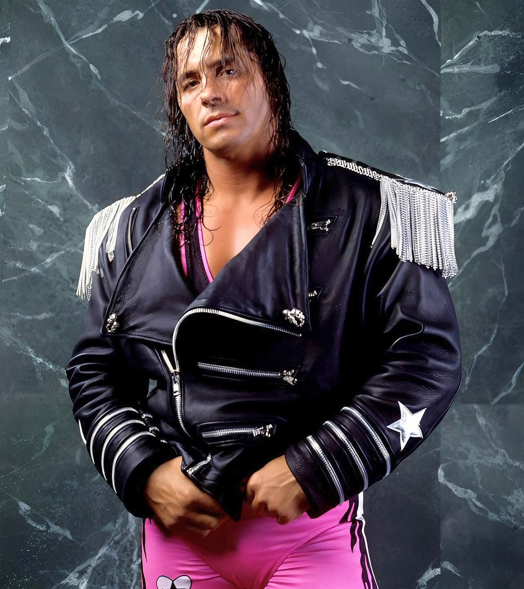 WWFWrestling1's tweet photo. 📷 WWF studio shot - Bret "Hitman" Hart! 📸 Photo from 1994. 🩷🖤 #WWF #WWE #Wrestling #BretHart https://t.co/Ade0tbaMn9