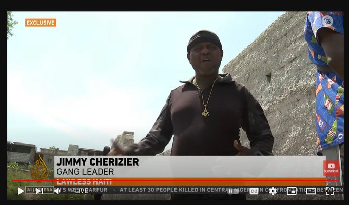 Vision4theBlind's tweet photo. Haiti is a country in chaos and armed gangs control much of the country.

Jimmy “Barbecue” Chérizier has become one of the most powerful figures in Haiti, with his gangs reportedly controlling much of the capital. 

Now take a look at the necklace he wears, what do you notice? https://t.co/4xx83bhJDL