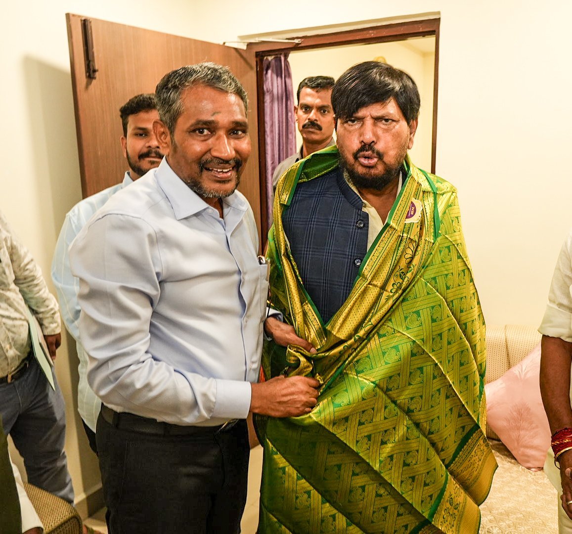 OffVanniArasu's tweet photo. நேற்று (17.07.26), சென்னை வருகை தந்த மாண்புமிகு ஒன்றிய சமூகநீதி மற்றும் அதிகாரமளித்தல் துறை இணை அமைச்சர் திரு. @RamdasAthawale அவர்களை மாண்புமிகு சமூகநீதித்துறை அமைச்சர் திரு. @VanniTamizhVCK அவர்கள் அரசு விருந்தினர் மாளிகையில் மரியாதை நிமித்தமாக சந்தித்தார்.

அத்துடன், 

1. பட்டியலின மாணவர்களுக்கான ப்ரீ மெட்ரிக் & போஸ்ட் மெட்ரிக் கல்வி உதவித்தொகை திட்டத்தின் கீழ் ஒன்றிய அரசின் பங்கை உரிய நேரத்தில் விடுவிக்க வேண்டும்
2. பட்டியலின மாணவர்களுக்கான ப்ரீ மெட்ரிக் & போஸ்ட் மெட்ரிக் கல்வி உதவித்தொகை பெறுவதற்கு பெற்றோர்களின் ஆண்டு வருமான உச்சவரம்பை ரூ.8 லட்சமாக அதிகரிக்க வேண்டும்
3. விடுதிகளில் தங்கி பயின்று வரும் மாணவர்களுக்கு போஸ்ட் மெட்ரிக் கல்வி உதவித்தொகை கீழ் வழங்கப்படும் Maintenance படியை உயர்த்தி வழங்க வேண்டும்
4. பட்டியலின மக்களின் சமூக பொருளாதார மேம்பாட்டுக்காக நடைமுறைப்படுத்தப்படும் ஒன்றிய அரசு திட்டமான PM-AJAY கீழ் நிலுவையில் உள்ள ரூ.154.08 கோடியை உடனே விடுவிக்க வேண்டும்
5. சிவில் உரிமைகள் பாதுகாப்பு சட்டம், 1955 மற்றும் வன்கொடுமை தடுப்புச் சட்டம், 1989 ஆகியவற்றை நடைமுறைப்படுத்துவதற்கு ஒன்றிய அரசு வழங்க வேண்டிய ரூ.61 கோடி நிலுவை தொகையை உடனே விடுவிக்க வேண்டும்
6. தமிழ்நாட்டில் உள்ள பட்டியலின மற்றும் பழங்குடியின சமூகங்களின் பெயர்களில் உள்ள  'ன்' விகுதியை 'ர்' விகுதியாக மாற்றுவதற்கு, உரிய சட்ட நடவடிக்கையை ஒன்றிய அரசு மேற்கொள்ள வேண்டும்.

உள்ளிட்ட கோரிக்கைகள் அடங்கிய மனுவை நமது சமூக நீதித்துறையின் சார்பில் மாண்புமிகு ஒன்றிய அமைச்சர் திரு. அதாவலே அவர்களிடம் வழங்கினார்.

நமது கோரிக்கைகளை கவனத்தோடு கேட்டறிந்த மாண்புமிகு ஒன்றிய அமைச்சர் திரு. அதாவலே அவர்கள், துறை அதிகாரிகளிடம் ஆலோசித்து நல்லதொரு முடிவு எடுக்கப்படும் என்று உறுதி அளித்தார். மேலும், இச்சந்திப்பின்போது சமூக நீதித்துறை செயலாளர் டாக்டர் என். சுப்பையன் அவர்கள் உடன் இருந்தார்.

@RamdasAthawale 

#TNGovt #socialjusticeministervanniarasu #officeofsocialjusticeminister