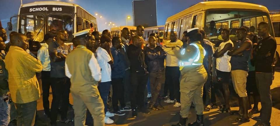 M_Kananura's tweet photo. 18 school buses transporting children from educational trips were intercepted last night at the Njeru Checkpoint.

In line with @Educ_SportsUg's directive suspending school trips & prohibiting night travel for schools already on trips, the buses were escorted to a safe parking area where they remained until morning.

They will be escorted by @PoliceUg to their respective destinations. Schools already on trips are reminded not to travel at night. Instead, they should report to the nearest Police station for guidance & where necessary a Police escort.

All return journeys must be undertaken between 6:00 a.m. & 6:00 p.m.

Together we can safeguard the lives of our children. #RoadSafetyUG #SafeSchoolTransport