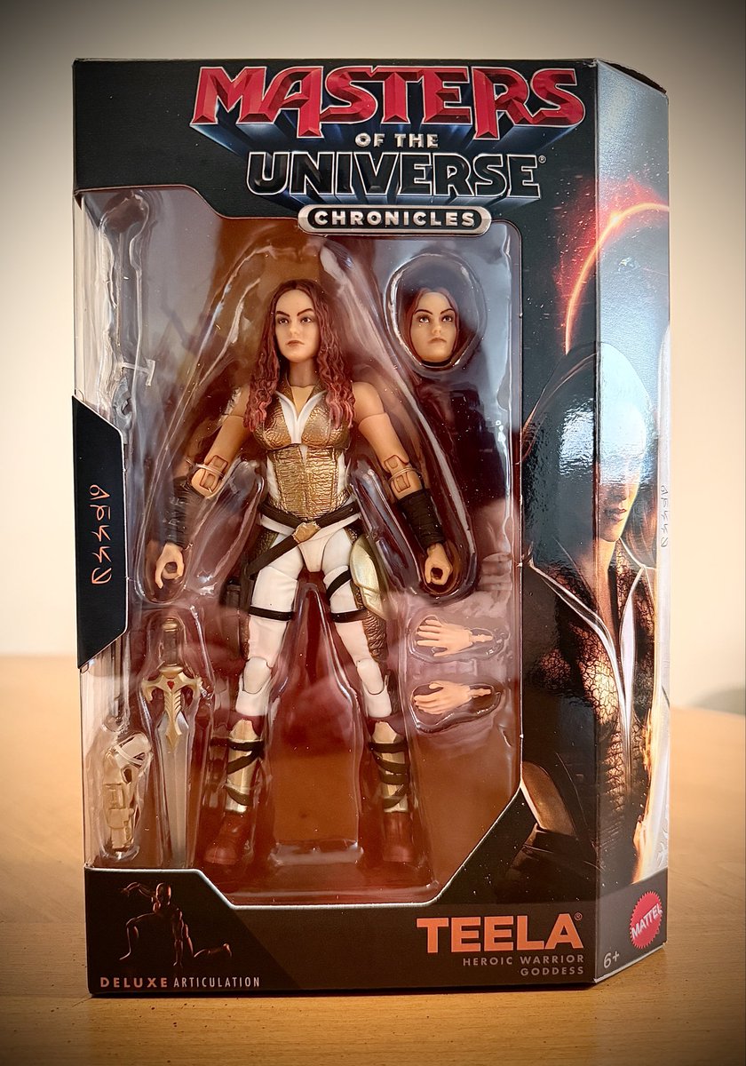 daniel_dias's tweet photo. The Warrior Goddess has arrived! Chronicles Teela finally joins the collection. And I almost missed her - I received a notification saying USPS couldn’t get in and would try again tomorrow. NOT ON MY WATCH! I ran to the street, the truck was still there… long story short, I’m out of breath, but here she is.

She’s such an important part of the @mastersmovie that the Chronicles shelf was feeling empty without her. The figure does a great job emulating Camila Mendes’ beauty and presence, and comes with an extra head, extra hands, and two weapons. She’s lean, powerful, and highly poseable.

You can get to know her here, and head on to the comments to see her with both her heads (one at a time, of course!), and joining the battle alongside her dad, Man-At-Arms.