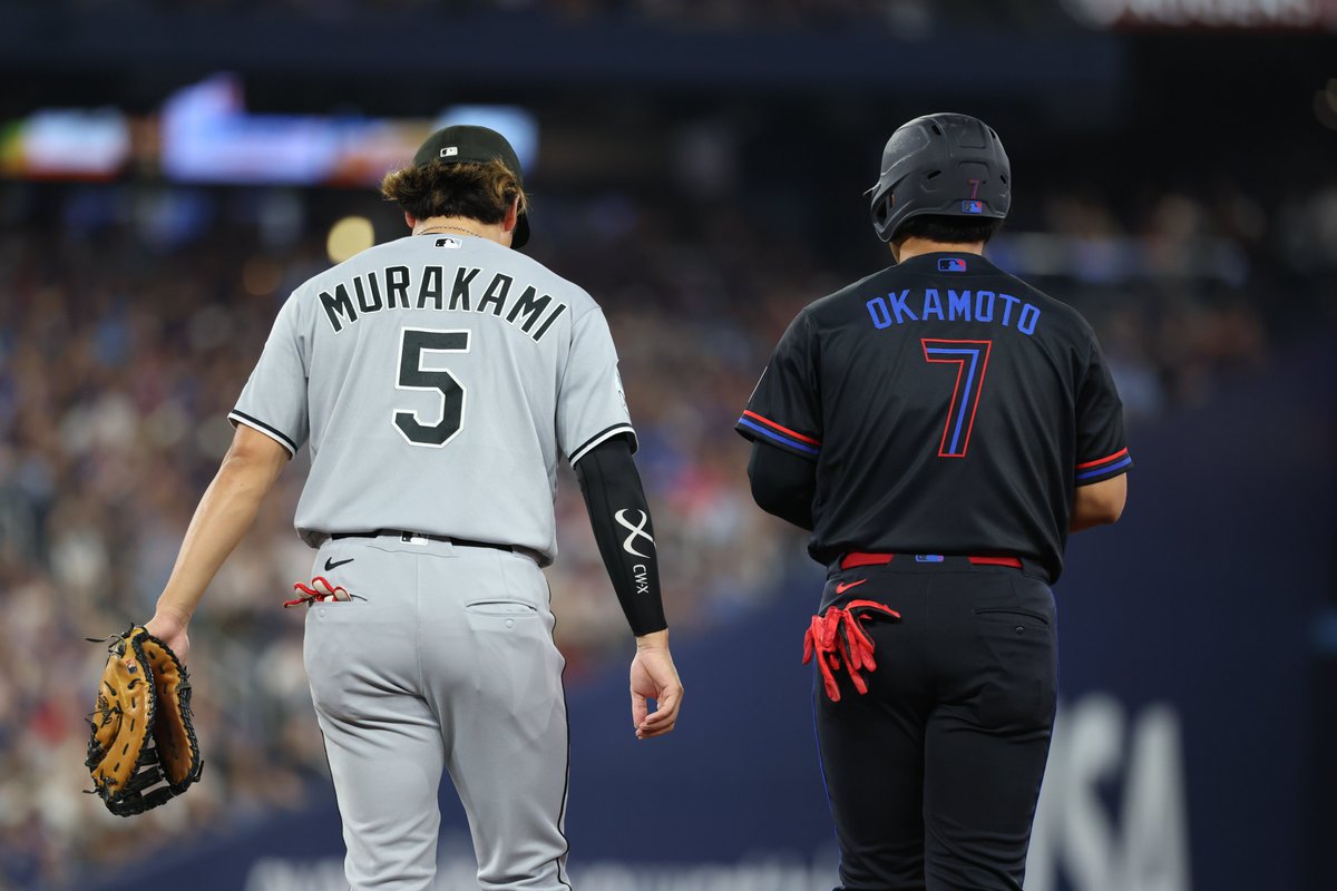 MLB's tweet photo. Munetaka Murakami and Kazuma Okamoto met up at first base tonight! https://t.co/Z8RONMVpel