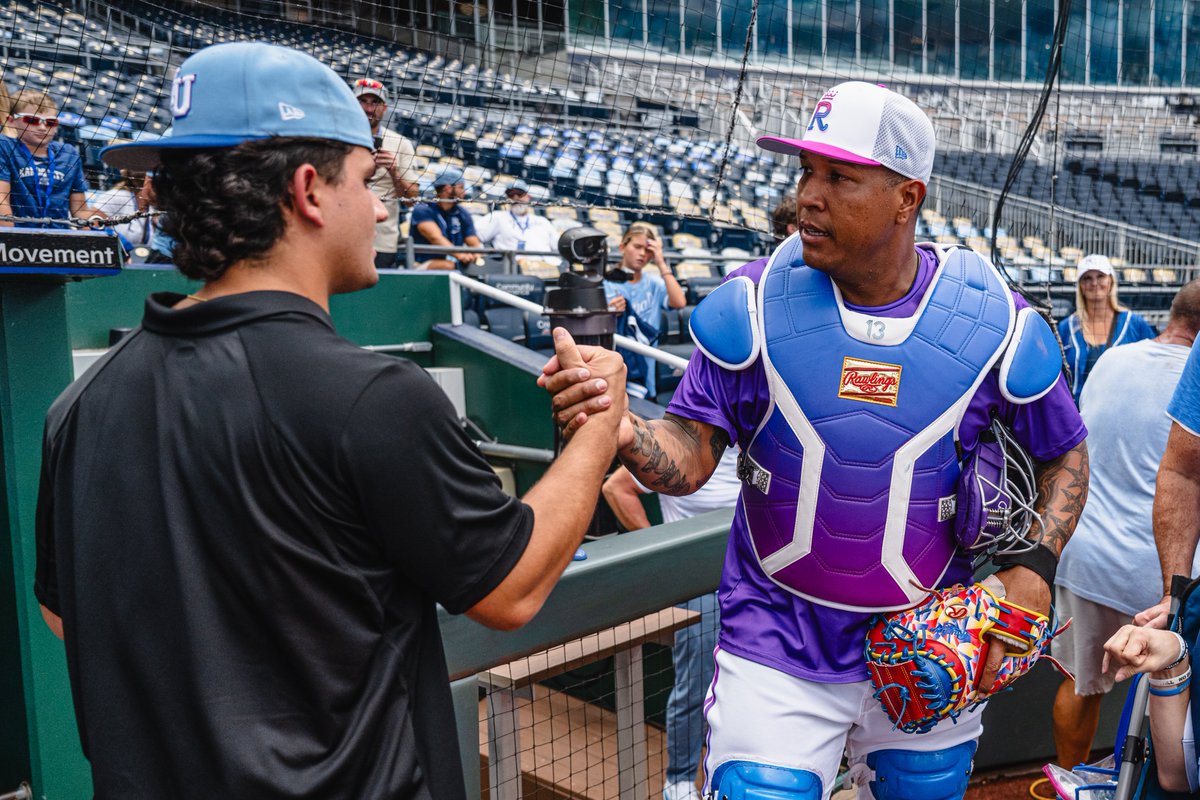KUBaseball's tweet photo. Auggie 🤝 Salvy

The two Venezuelan catchers got the chance to meet before tonight's game! 🇻🇪

#RockChalk x @Royals https://t.co/jdZwNmj4ce