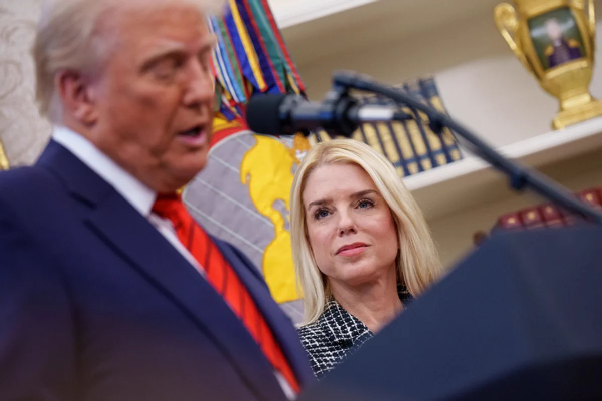 This image shows U.S. President Donald Trump and former Attorney General Pam Bondi.