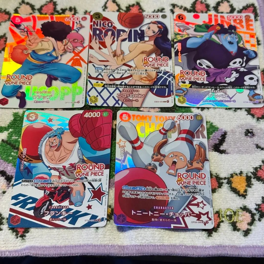 In-person shots of some of the Japanese OPTCG Round1 Promo Cards