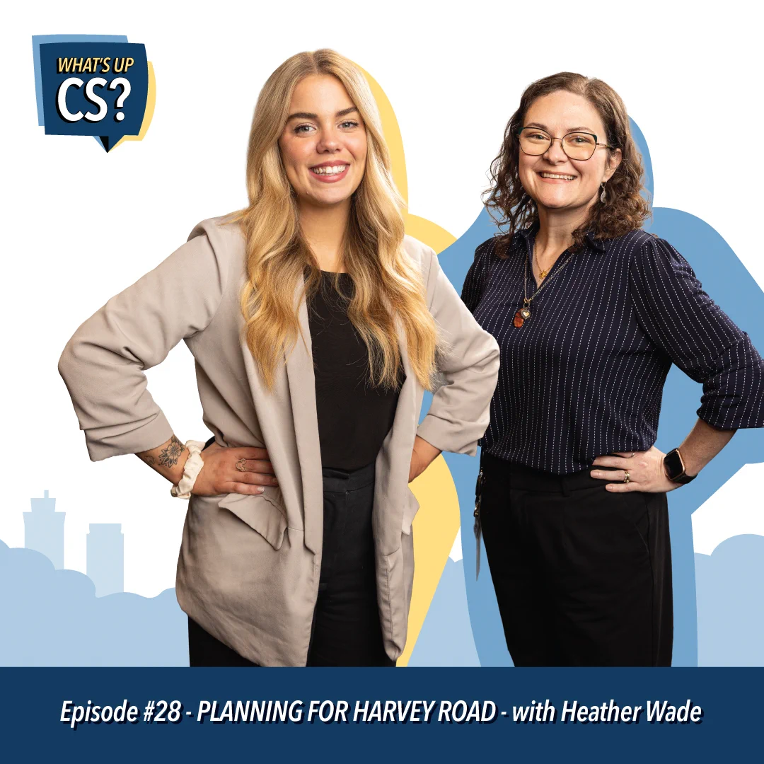 Two smiling individuals stand side by side in front of a graphic backdrop with the text "What's Up CS?" in the corner. They are dressed in business-casual attire. The text below reads: "Episode #28 - Planning for Harvey Road - with Heather Wade."