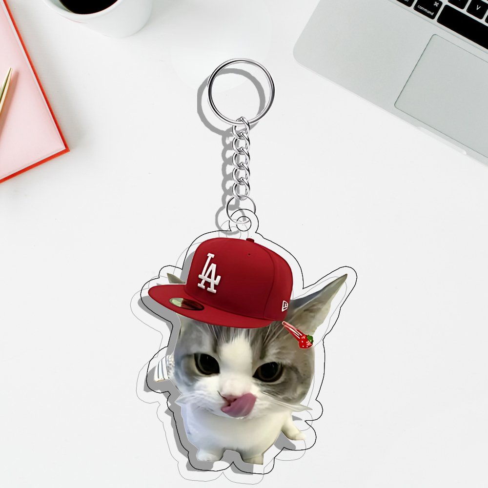 alsacart's tweet photo. OBSESSED... 
these meme cat keychains are too cute 😭 https://t.co/uIdG5s6HBG