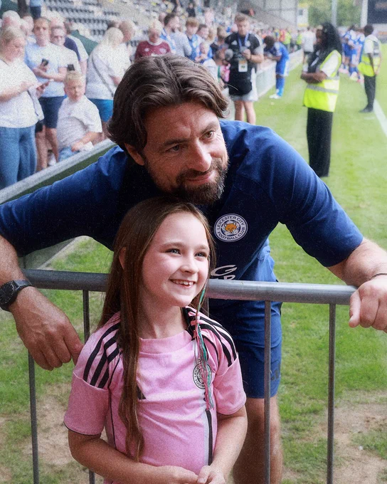 Russell Martin has a photo with a young Leicester City fan.