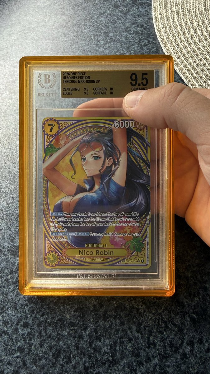 TCGBeacon's tweet photo. @MediaGiraffes Huge pull, congrats! 🤩
Just got mine back from grading, the artwork looks even crazier in a slab. 🏴‍☠️ https://t.co/QQKgqycdWY