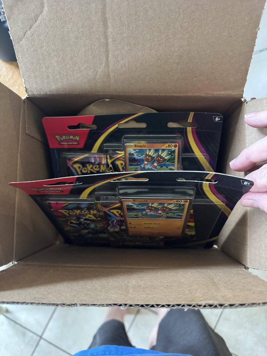 Pookibear85's tweet photo. @Target You got some explaining to do. We ordered Pitch Black ETB’s and you sent these! I spent $120 to receive $30 product we received 🤬 I know of one other person this happened to which means your employee screwed up big time. Or they stole them?? #Target #PitchBlack #tcg https://t.co/i932QSEPxn