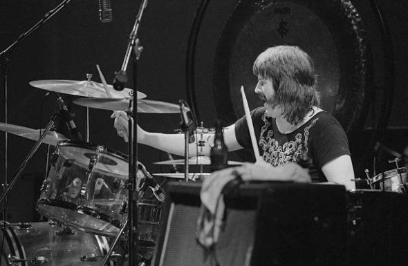 crockpics's tweet photo. John Bonham holding down the beat for Led Zeppelin at Earls Court, May 1975. A masterclass behind the kit captured by Michael Putland. 

Led Zeppelin returned home to London for five historic, marathon nights at Earls Court that became the stuff of rock folklore. https://t.co/WbIQo95NRf