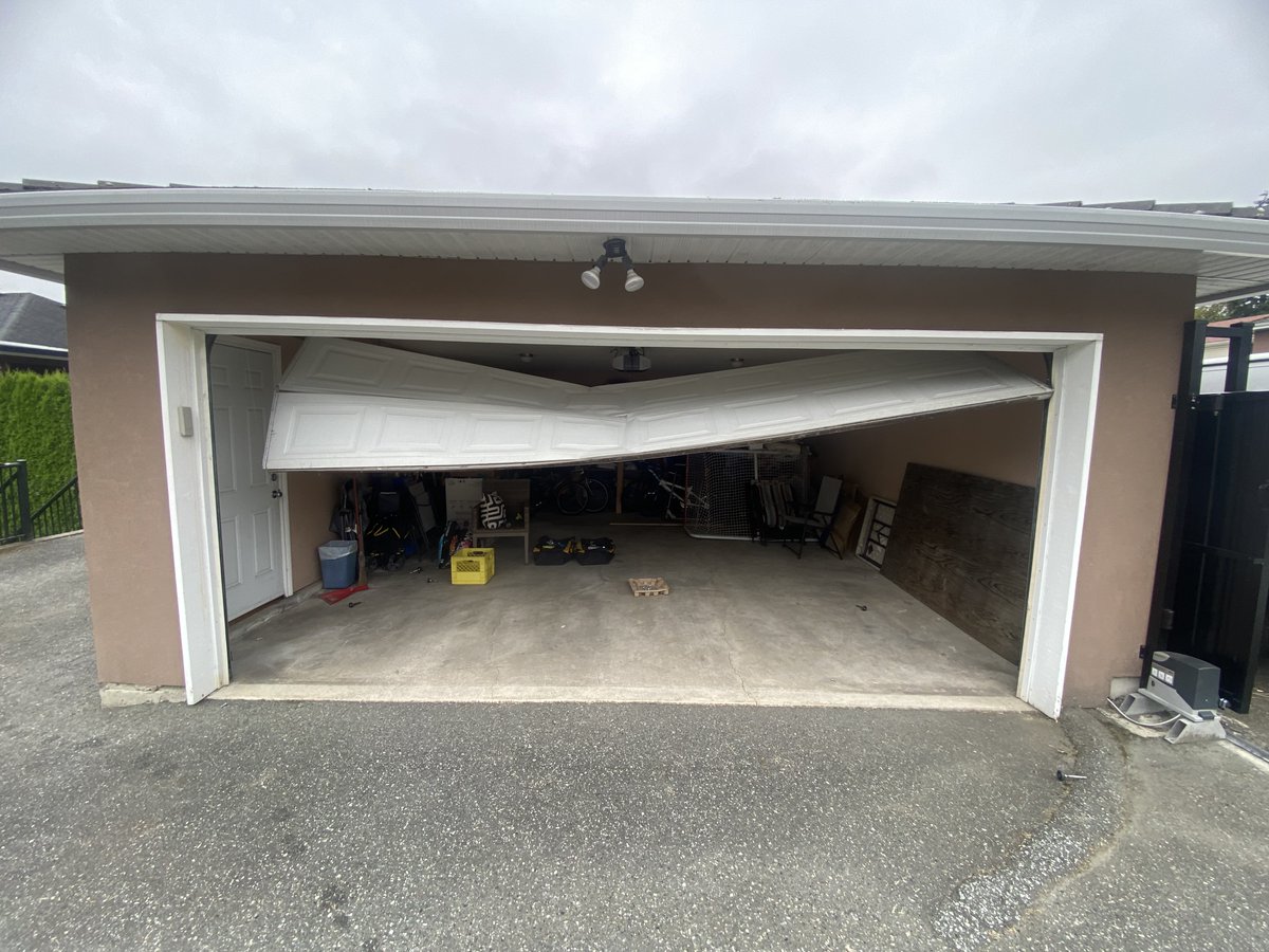 GarageGuruVan's tweet photo. What Should You Do If Your Garage Door Is Beyond Repair?

If your garage door won't open, won't close, and has completely stopped working, don't panic—and don't try to force it.

A garage door that has reached the end of its life can become a serious safety risk. Broken springs, damaged tracks, bent panels, or a failed opener can make the entire system unsafe to operate.

The best solution is to have it professionally inspected. In many cases, replacing the entire garage door is safer, more reliable, and more cost-effective than repeatedly repairing an old system.

At Your Garage Guru Ltd., we can help you every step of the way:

✔ Complete garage door inspections
✔ Honest recommendations—repair if possible, replace if necessary
✔ Removal of damaged garage doors
✔ Installation of modern, safe, and reliable replacement doors
✔ Fast service across Vancouver & the Fraser Valley

A new garage door doesn't just restore access to your garage—it improves your home's security, appearance, and everyday convenience.

Don't let a broken garage door disrupt your life. Let our experienced team help you find the right solution.

📞 Contact us today for a free quote.
🌐 https://t.co/ot47E8SfxP
#VancouverBC #GarageDoorReplacement #GarageDoorRepair #GarageDoors #HomeImprovement #FraserValley #GarageDoorInstallation