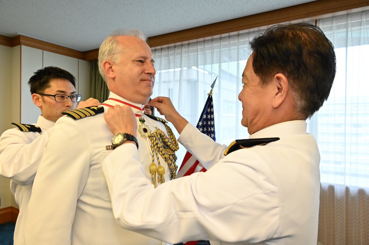 USAmbJapan's tweet photo. A huge congratulations to @USNavy Captain Dan Fillion, @usembassytokyo ’s Defense Attaché, on being honored by the Japanese government. Admiral Saito, Japan’s Maritime Self-Defense Force Chief of Staff, presented him with the Order of the Rising Sun, with Gold Rays for his contributions to strengthening the U.S.-Japan Alliance. Well-deserved recognition!