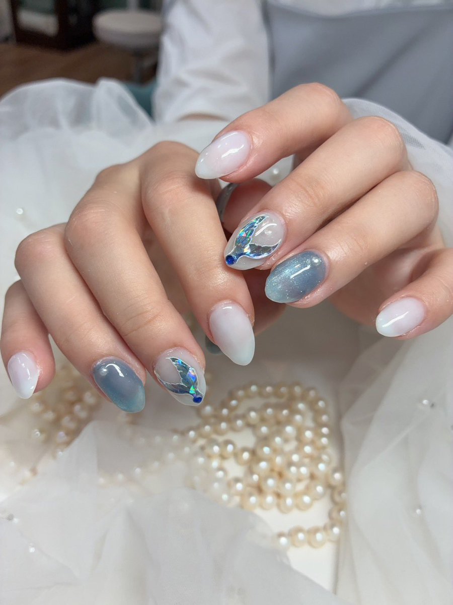 ran0000016's tweet photo. 新nailは夏っぽ！🩵💙
人魚のヒレが付いてるー！𓆝𓂃 𓈒𓏸 https://t.co/gTl4eYqeH2