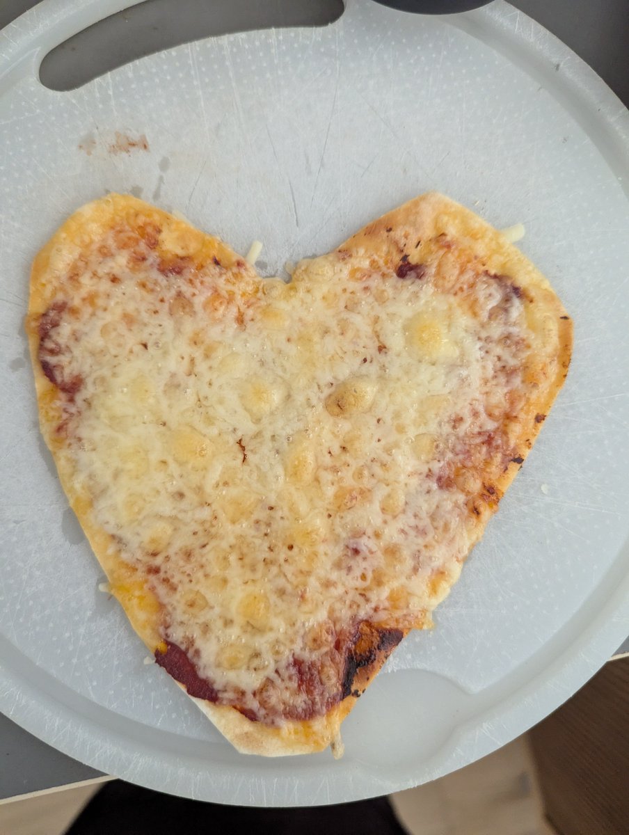 m4rced's tweet photo. I made the pizza recipe again but in a heart shape!! https://t.co/6xteXyfUXF