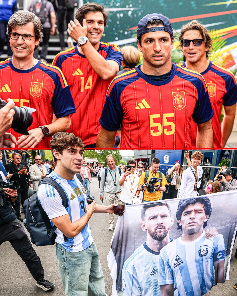 autosport's tweet photo. World Cup final fever 🇪🇸🇦🇷

Sainz and his team pulled up in Spanish shirts, while Colapinto brought the Messi/Maradona banner. https://t.co/B8zCjVCe6t
