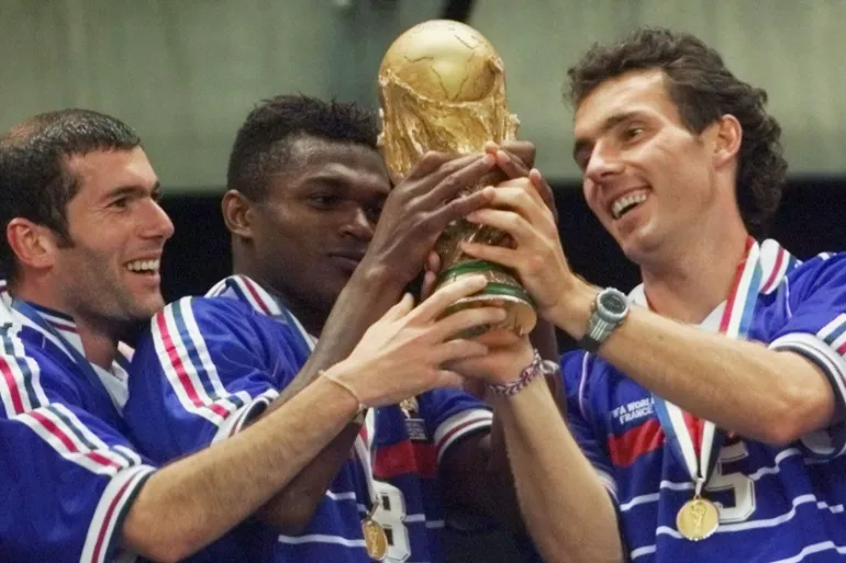 AlphenMatthias's tweet photo. #WorldCupCountdown
#5 of 12: France 1998 (1998 FIFA World Cup)
Host: France
Final: France 3-0 Brazil
Top goal scorer: Davor Suker, Croatia
The 1998 World Cup was unforgettable for so many reasons. France became the sixth host nation to lift the trophy, claiming their first-ever World Cup title after an outstanding tournament on home soil.
The competition also took place against a dramatic backdrop. Despite authorities uncovering and preventing a major terrorist plot targeting the tournament, the World Cup went ahead as planned. More than 100 people were arrested in connection with the conspiracy, which was reportedly financed by Osama bin Laden.
This was also the first World Cup to feature 32 teams, welcoming newcomers Croatia, Japan, Jamaica and South Africa. Croatia made the biggest impression, finishing third behind the goals of Davor Šuker. They stunned Germany 3-0 in the quarterfinals before defeating the Netherlands in the third-place match, announcing themselves as a future World Cup powerhouse.
There was no shortage of star power either. A teenage Michael Owen produced one of the tournament's greatest goals against Argentina, while Nigeria's talented "Golden Generation" featuring Jay-Jay Okocha, Kanu, Sunday Oliseh and Celestine Babayaro thrilled fans by topping a difficult group that included Spain. Roberto Baggio also made his final World Cup appearance, although Italy's campaign ended in another heartbreaking quarterfinal exit.
Few matches are remembered as vividly as England's clash with Argentina. Owen's breathtaking solo goal remains one of the finest in World Cup history, but the game is equally famous for David Beckham's red card after kicking Diego Simeone. Reduced to ten men, England eventually lost on penalties, making Beckham the country's most criticized footballer overnight before he later rebuilt his reputation.
The knockout stage produced even more iconic moments. Dennis Bergkamp's sublime last-minute winner against Argentina, controlling a long pass, cutting inside his defender and finishing brilliantly, is still considered one of the greatest World Cup goals ever scored. Goalkeepers Fabien Barthez and José Luis Chilavert also shone throughout the tournament, with Chilavert adding excitement by regularly taking Paraguay's free kicks.
The final carried plenty of drama before kickoff. Brazil superstar Ronaldo suffered a mysterious medical emergency on the day of the match and was briefly hospitalized after experiencing convulsions. Although he ultimately started the game, he was clearly nowhere near his best.
France took full advantage. Zinedine Zidane scored twice with towering headers from corners before Emmanuel Petit sealed a dominant 3-0 victory. It was a famous triumph that crowned France as world champions for the first time and cemented Zidane's place among the game's all-time greats. While many remember him for the 2006 final, his commanding performance in Paris four years earlier remains one of the finest displays ever seen in a World Cup final.