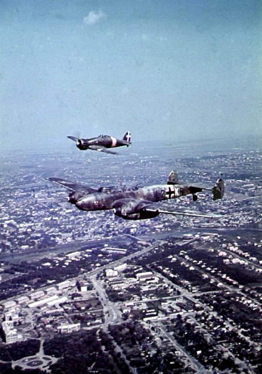 TheWorldatWar2's tweet photo. A German Messerschmitt Bf 110C-3 from the 7th Squadron of the 2nd Training and Combat Squadron (7.(F)/LG 2) and an Italian Macchi MC.200 Saetta fighter in flight over Italy - date unknown CREDIT : Destroye83 #italy #messerscmitt #bf110 #saetta #macchi #aircraft #aviation #ww2 https://t.co/DVu08u7FWn