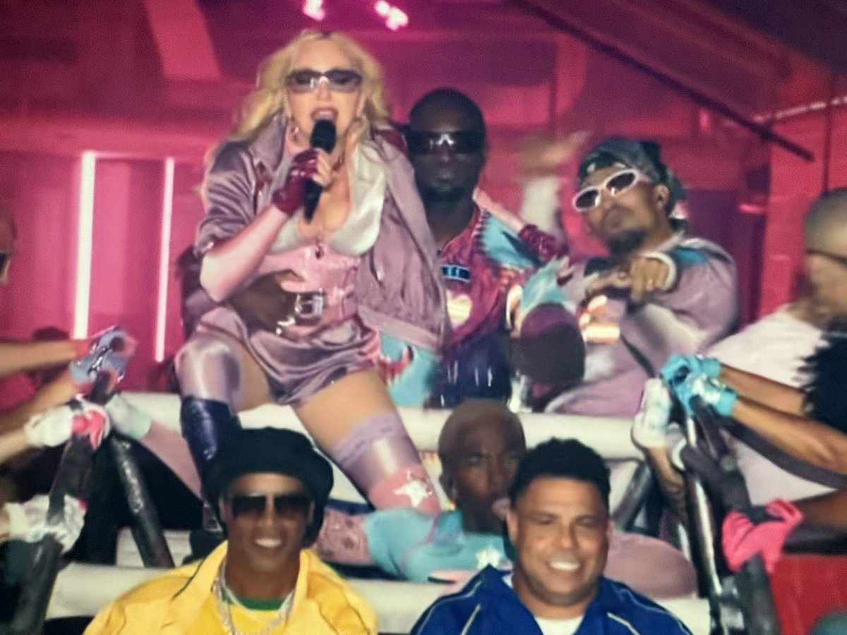 CaioFontenele's tweet photo. You come back to the tv and find Madonna, Ronaldo and Ronaldinho in this wild rollercoaster - it can’t be real https://t.co/BVwE2fuIrd