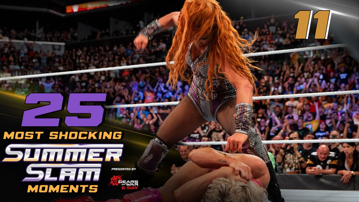 WWE's tweet photo. Most Shocking #SummerSlam Moment No. 11: Becky Lynch demolishes Charlotte Flair in post-match ambush at SummerSlam 2018.

Presented by @GearsofWar: E-Day

▶️: https://t.co/0vd4wFFIMm https://t.co/E8jy3TccVM