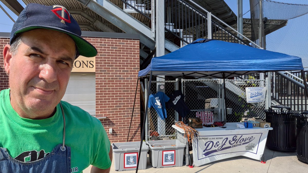 DJGloveRepair's tweet photo. All set up at Castle Field for the @MinnokaGrays game and was immediately handed a guy's old college gamer he wants relaced in red for his son. I better get going on it! https://t.co/ZCsbWmNP6g
